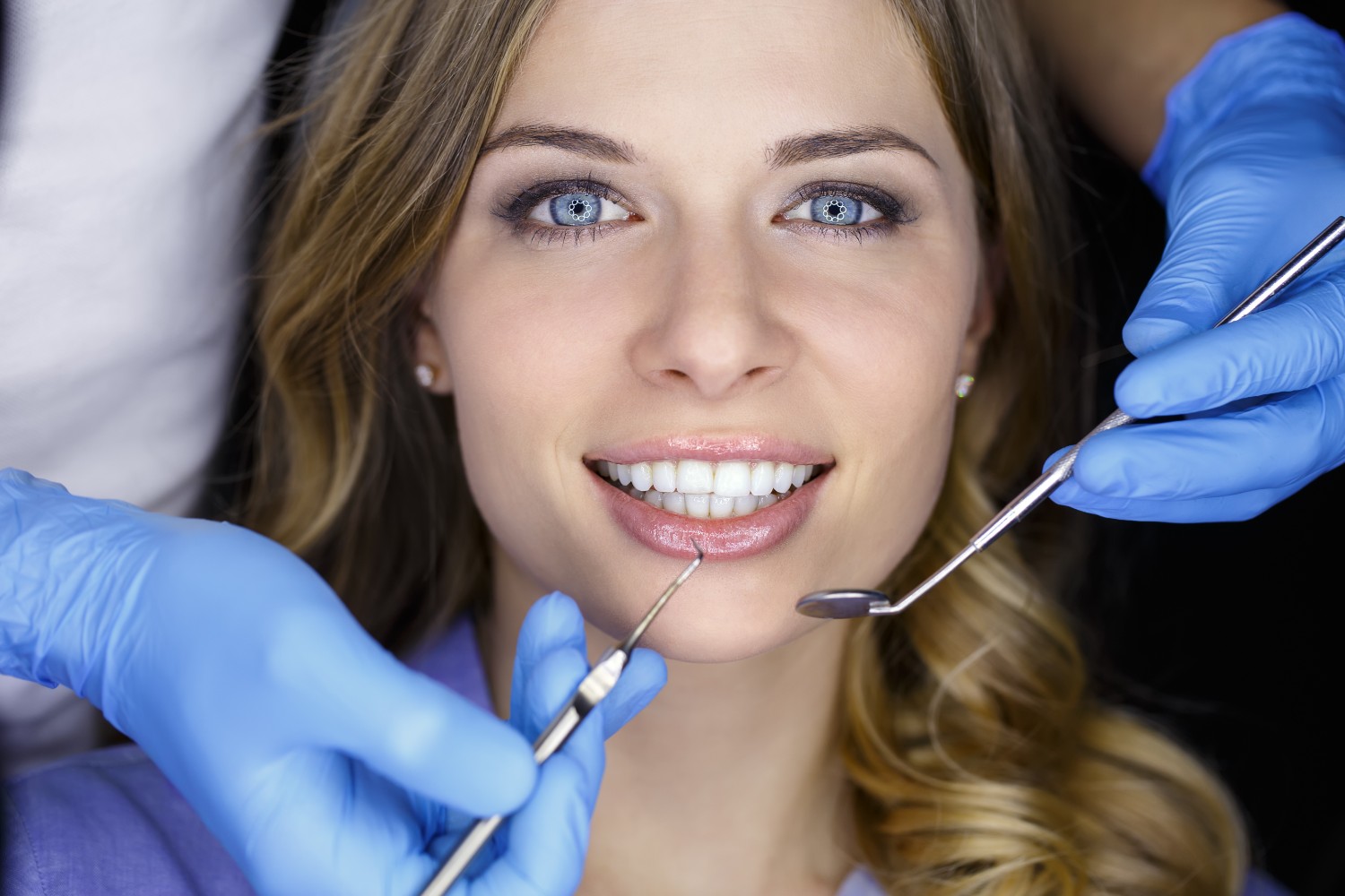 Girl getting her teeth cleaned